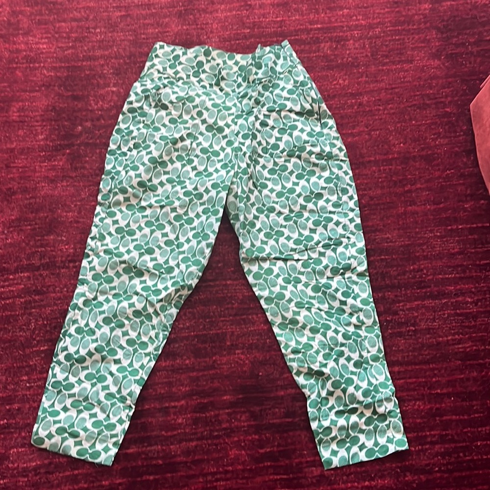 Green print pants with pockets. Size US 8